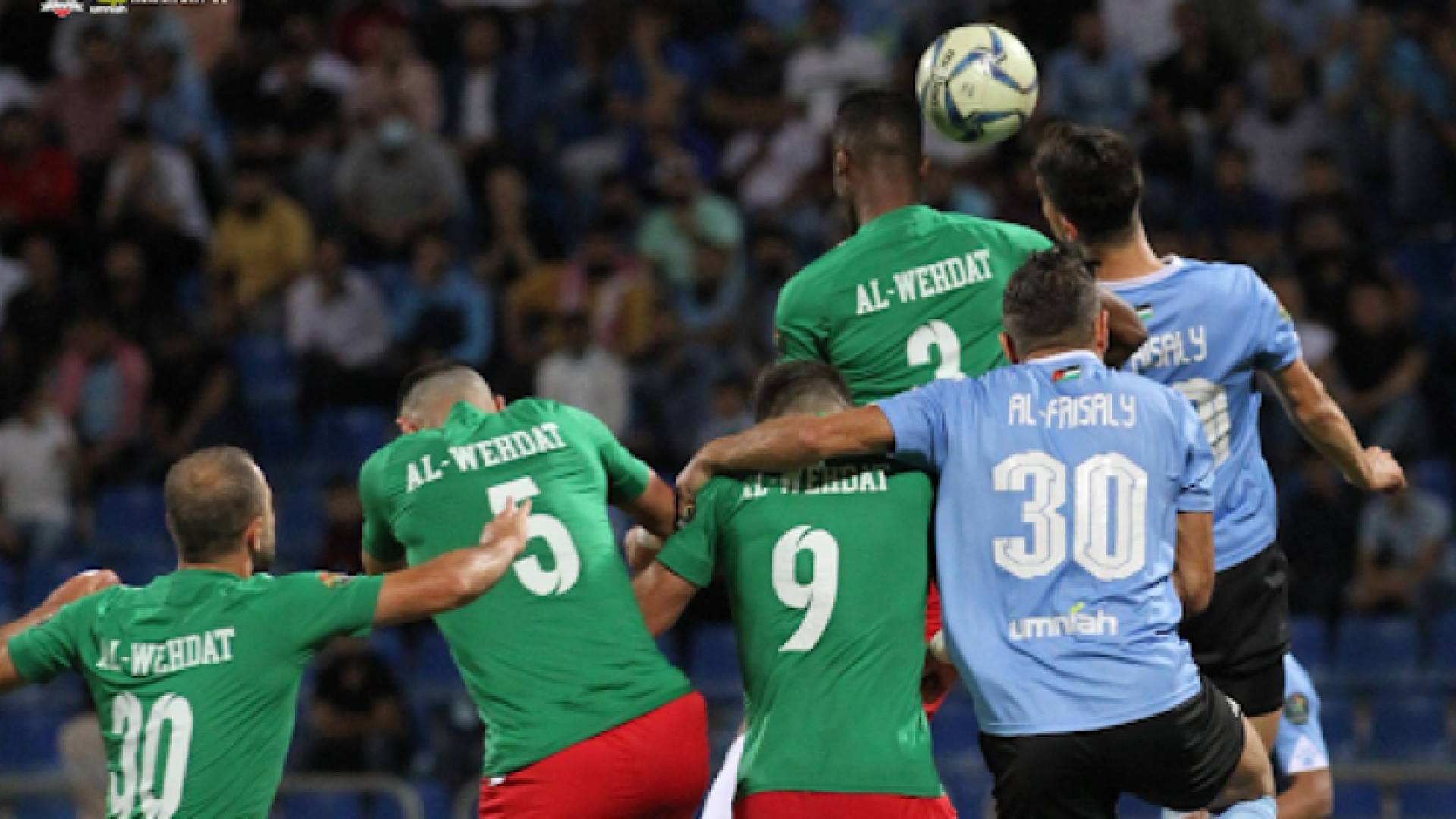 لاعبو الوحدات والفيصلي في مباراة سابقة - أرشيفية