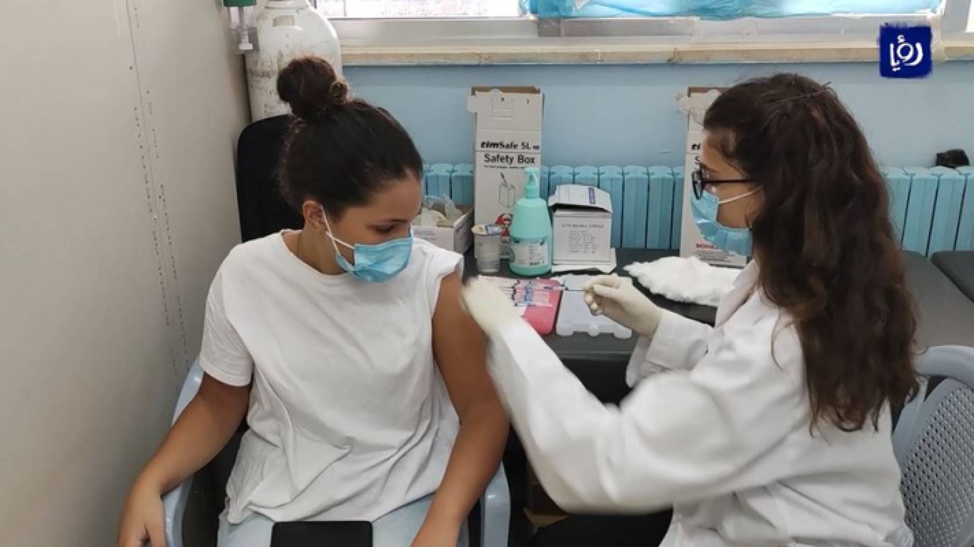 الصورة من احد مراكز التطعيم