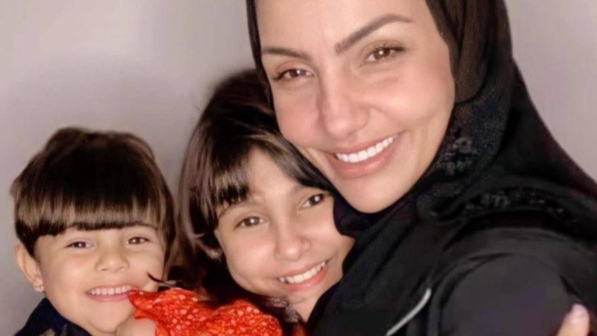 آلاء عبد الرحمن وطفليها