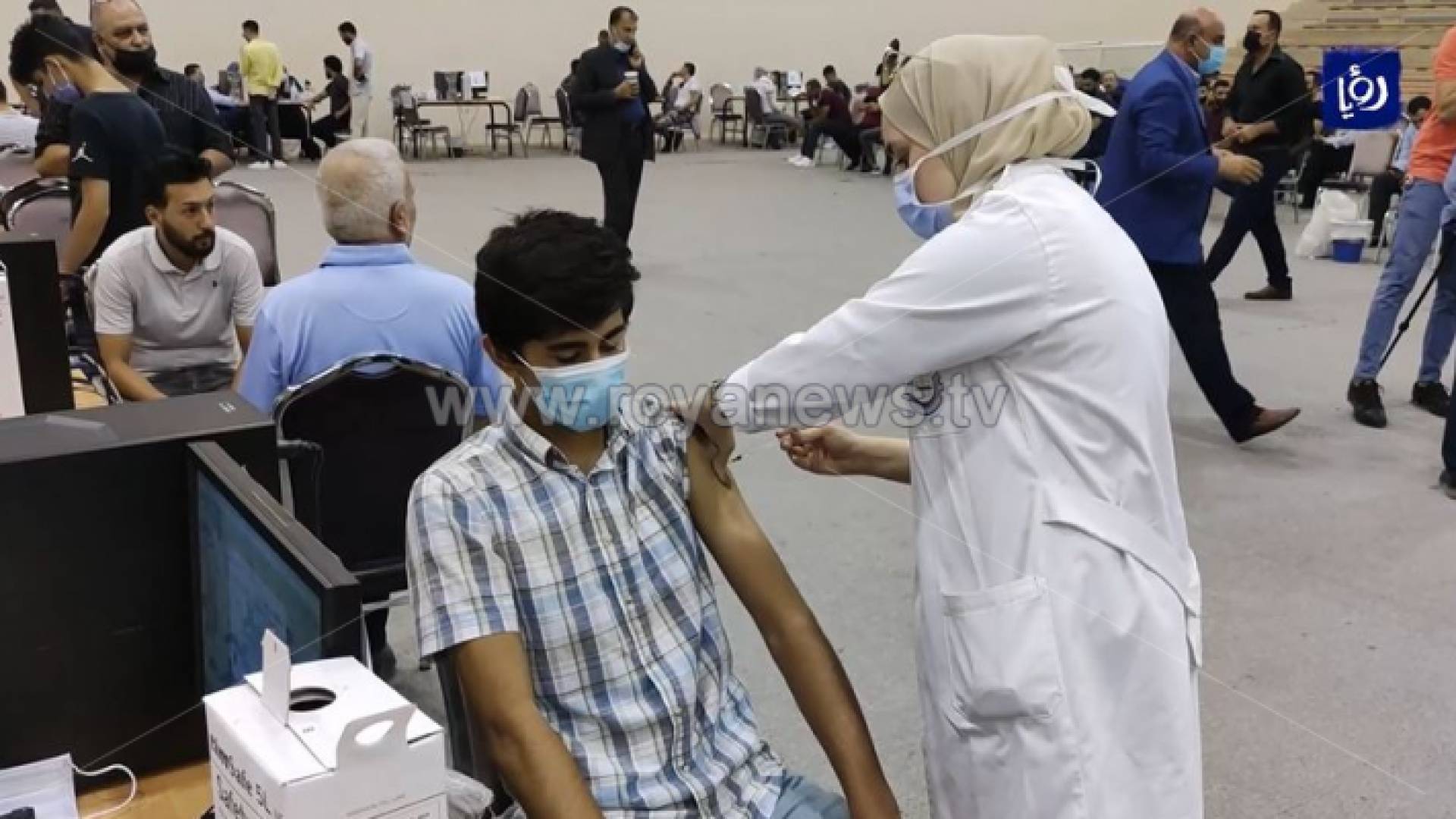 الصورة من احد مراكز التطعيم