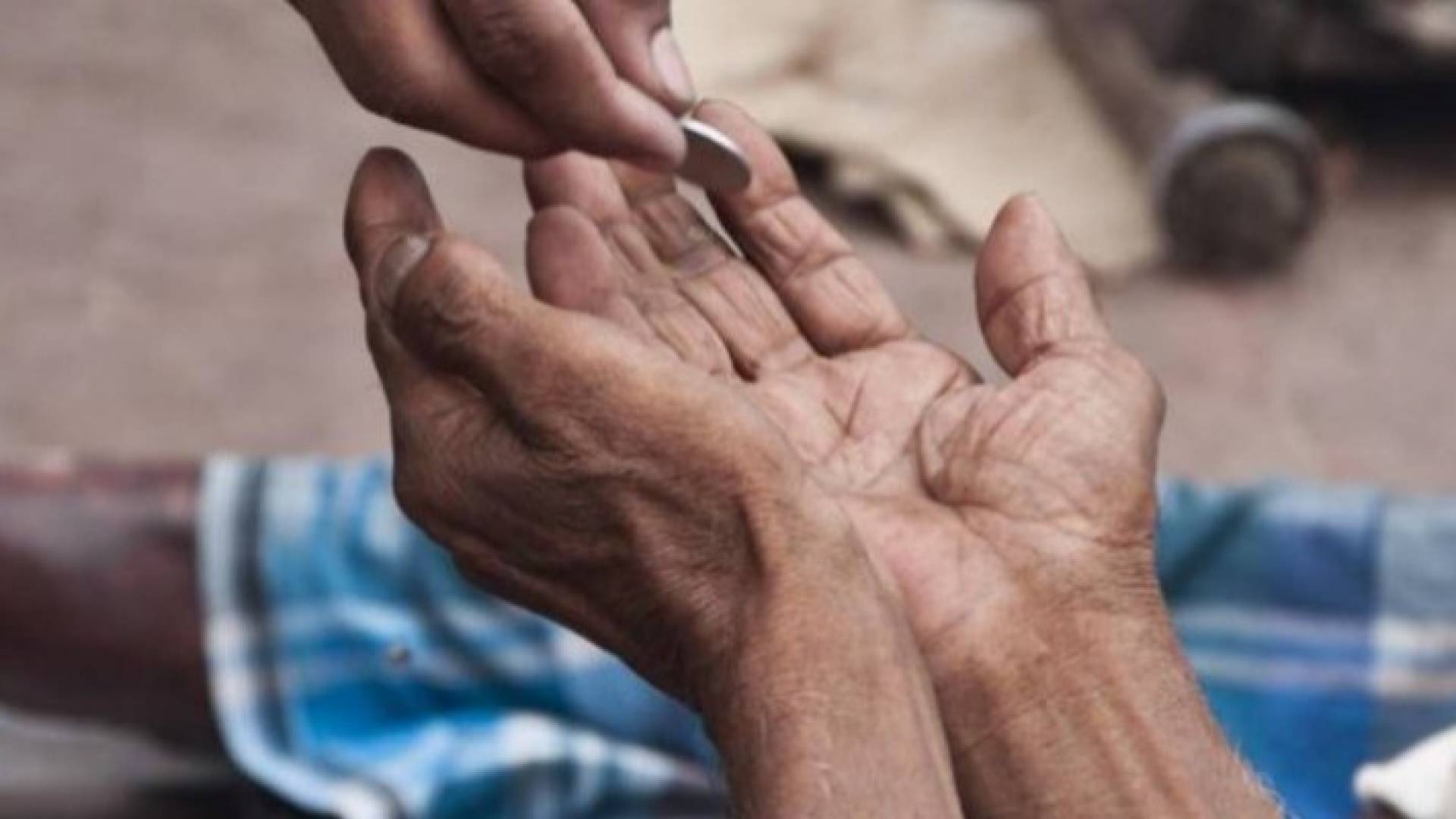 متسول - أرشيفية