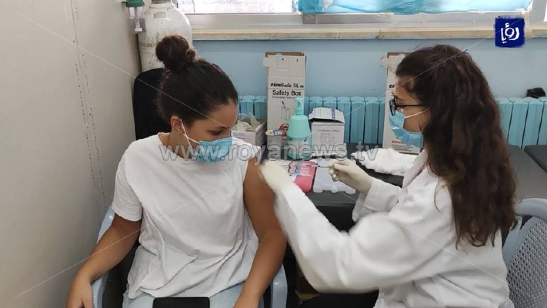 الصورة من احد مراكز التطعيم