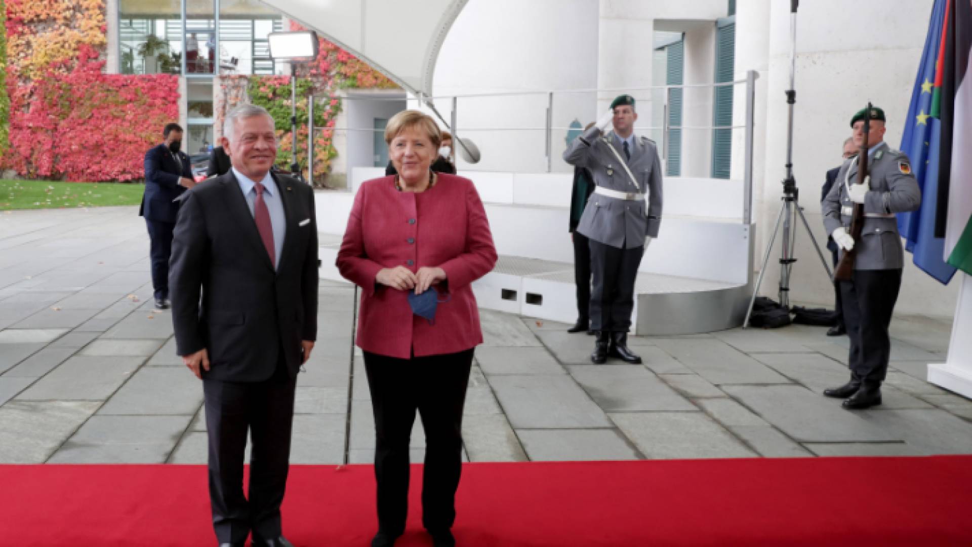 الملك والمستشارة الألمانية