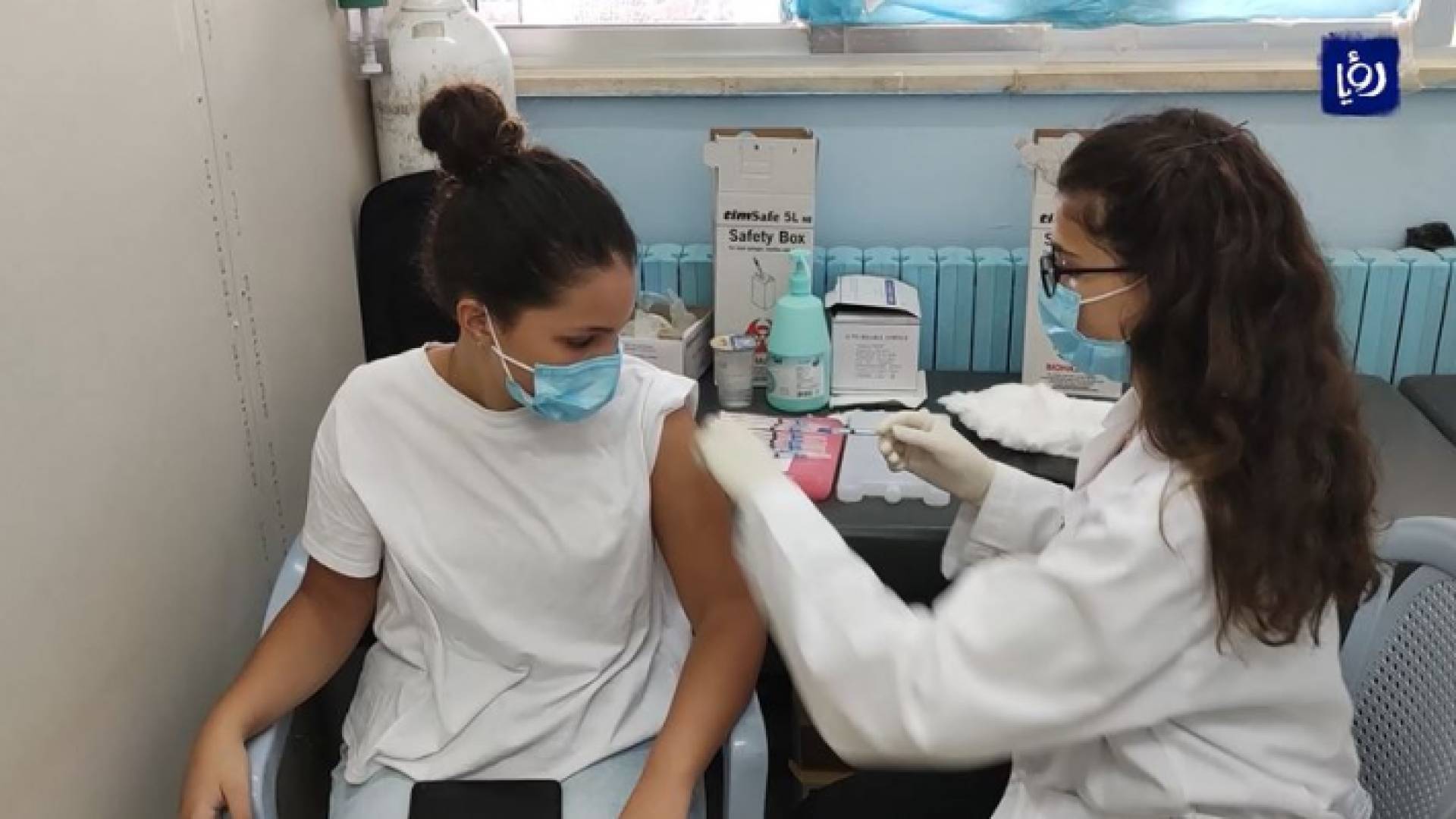 الصورة من احد مراكز التطعيم