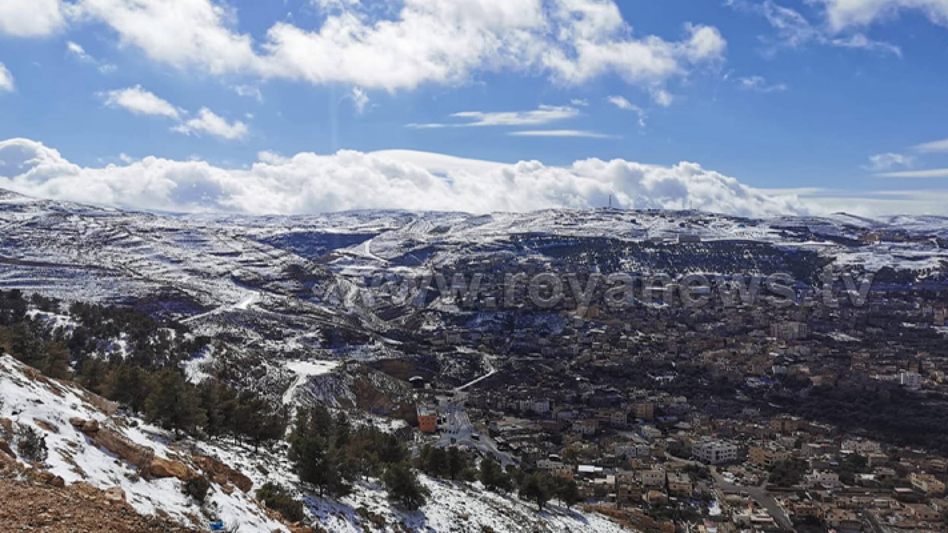 إحدى مرتفعات محافظة الطفيلة خلال المنخفض الجوي الأخير