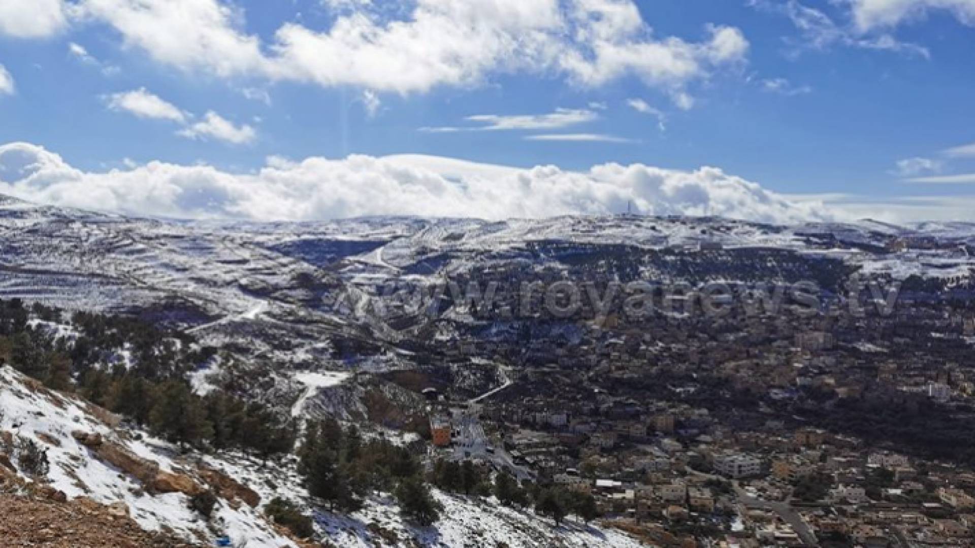 إحدى مرتفعات محافظة الطفيلة خلال المنخفض الجوي الأخير