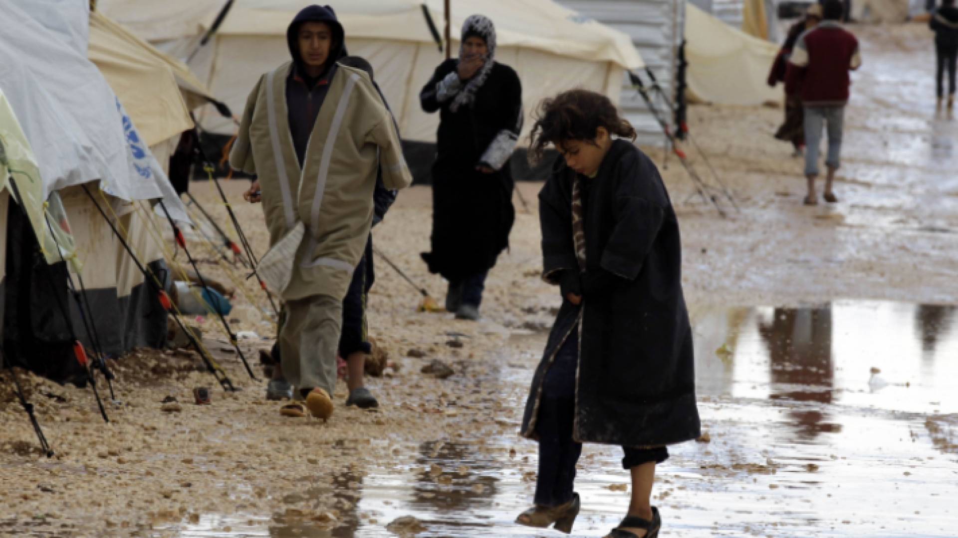 لاجئة في أحد المخيمات