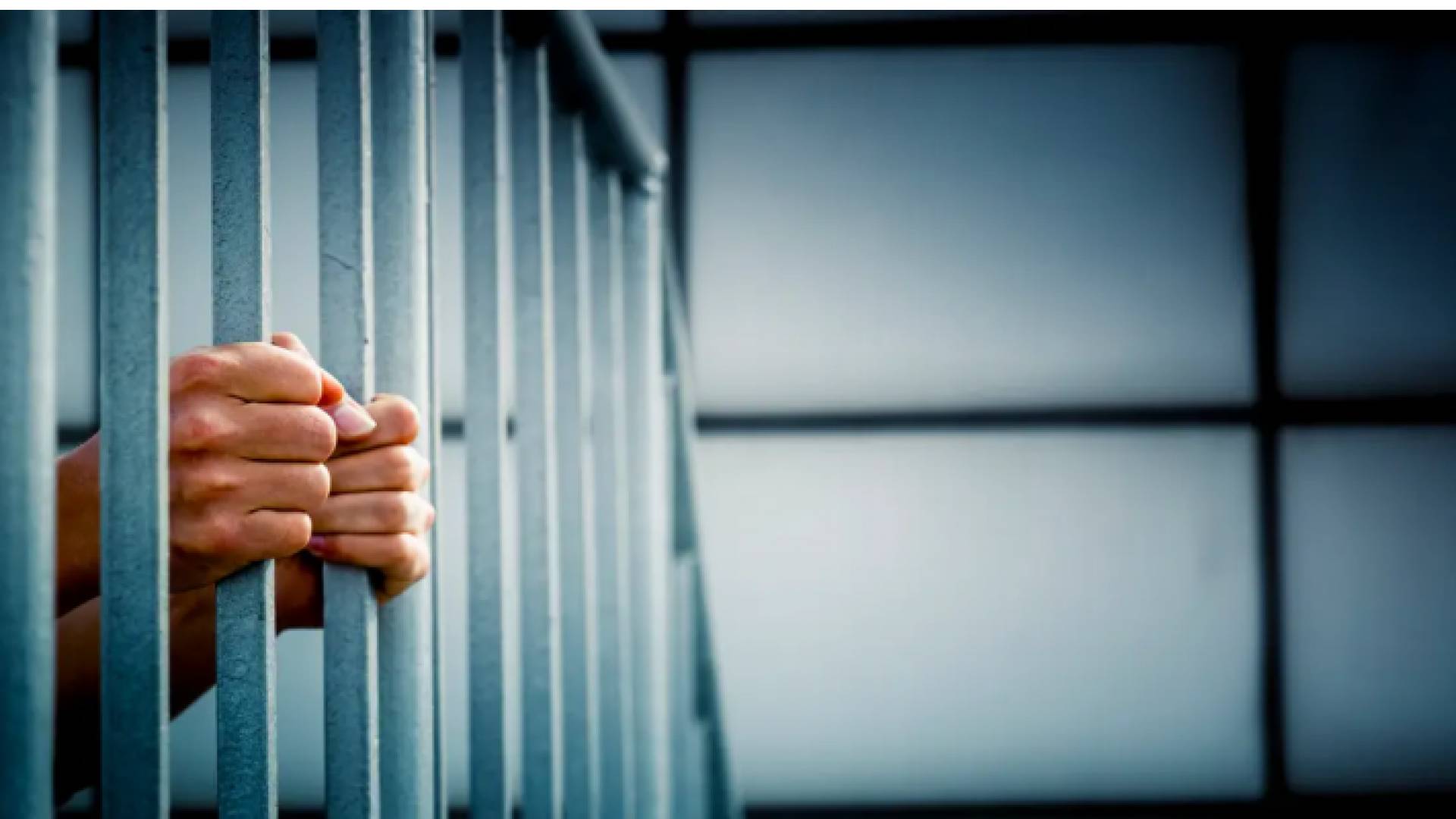 سجين خلف القضبان - تعبيرية