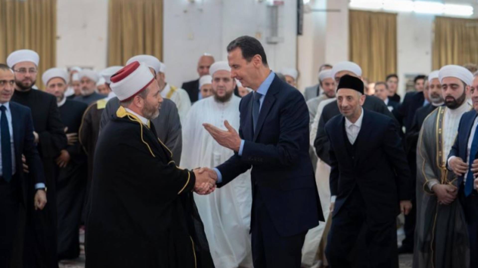 الرئيس السوري بشار الأسد وامام جامع الحسن بدمشق