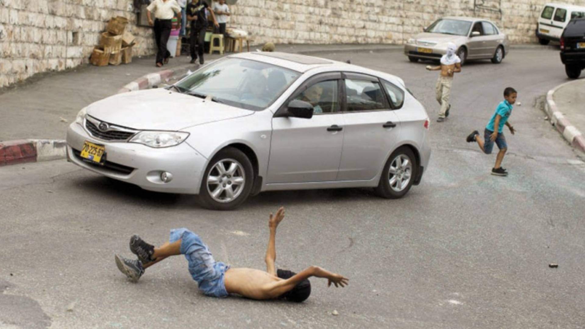 مستوطن يدعس طفلا - أرشيفية