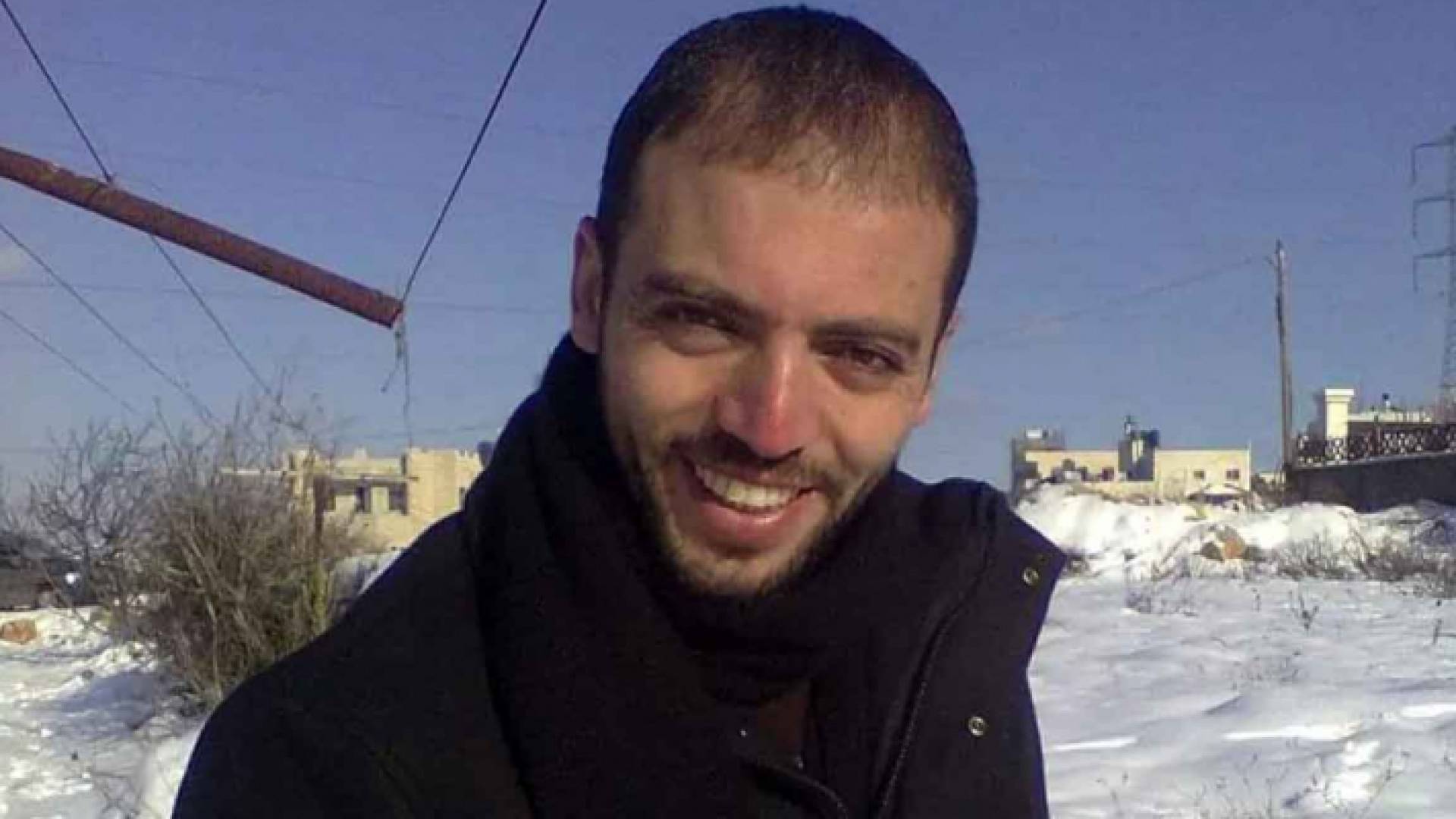 صورة للمعتقل في سجون الاحتلال الإسرائيلي خليل عواودة