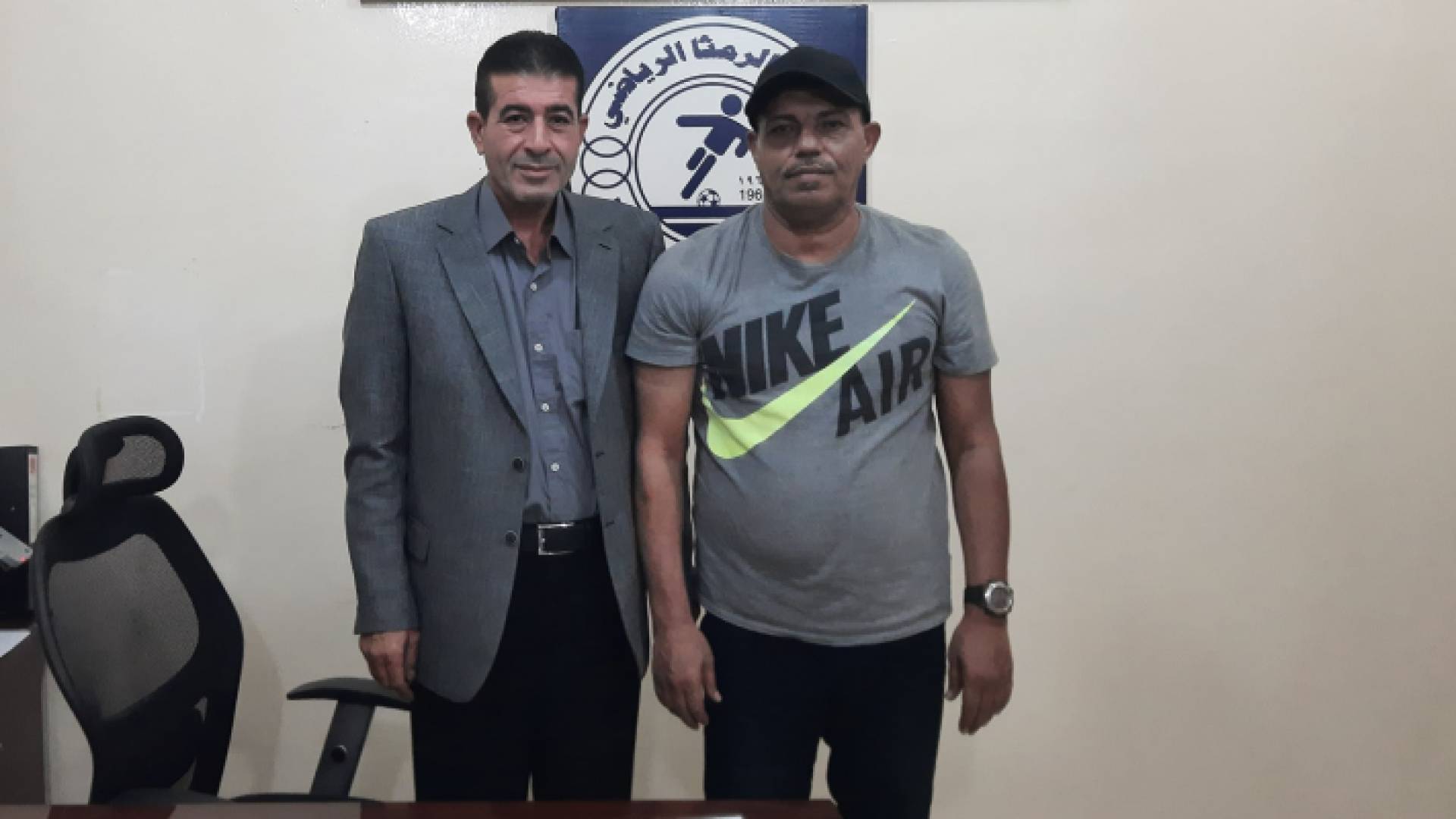 أسامة قاسم ورئيس النادي خالد الزعبي