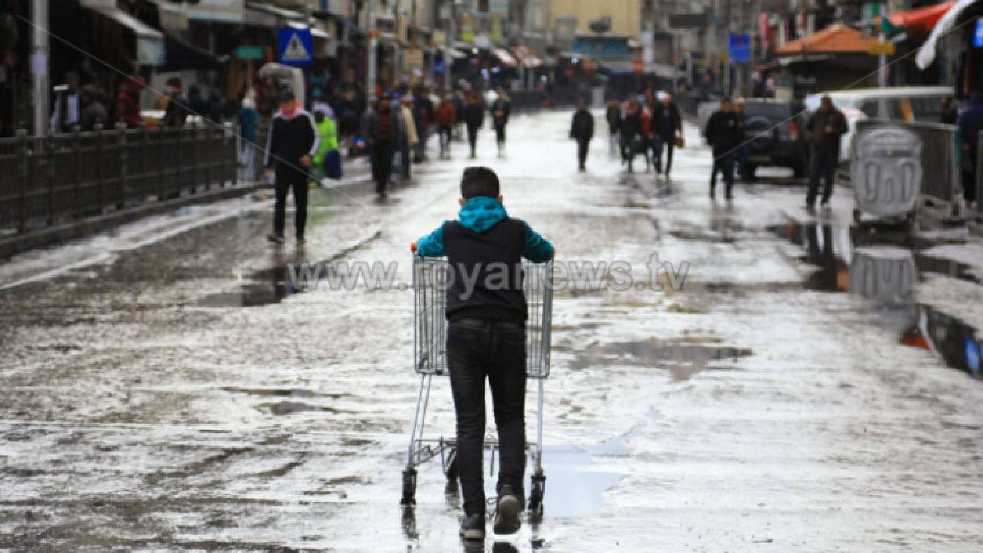 صورة أرشيفية لأمطار في أحد شوارع العاصمة عمان