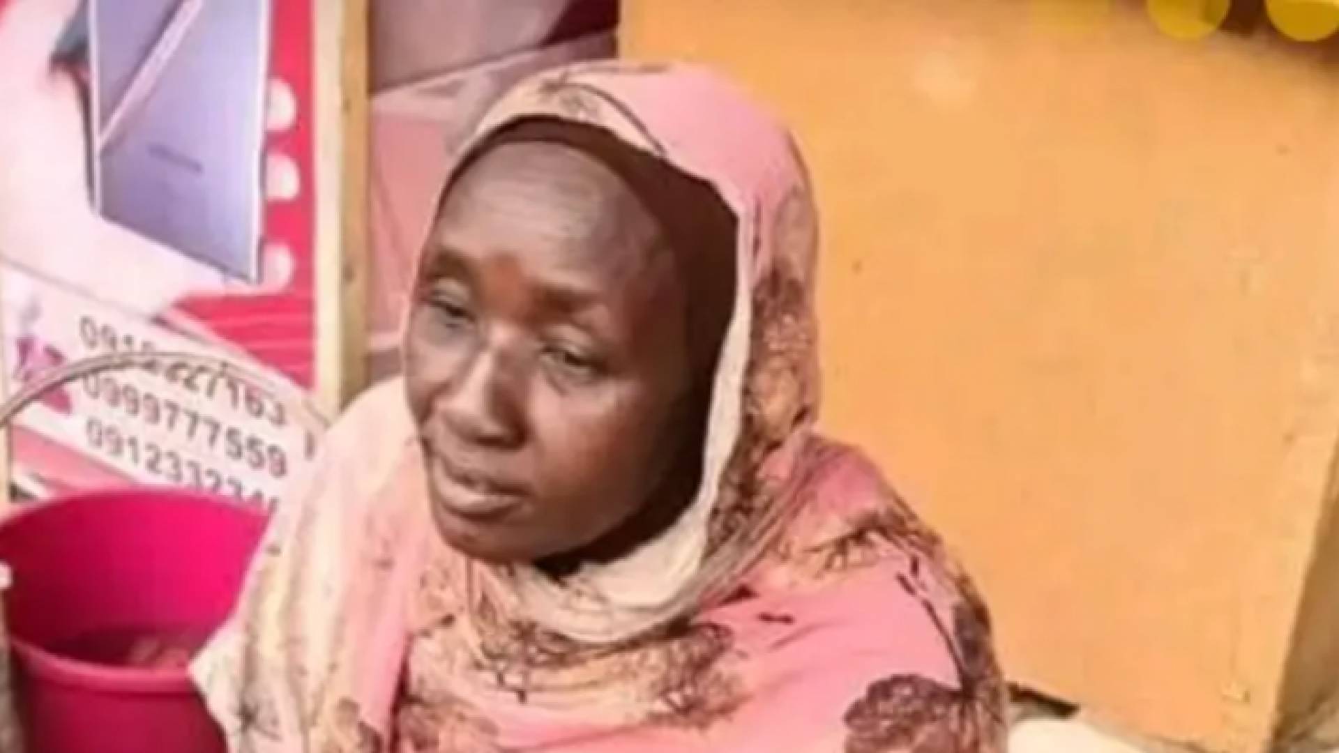 السيدة السودانية "بائعة الشاي"