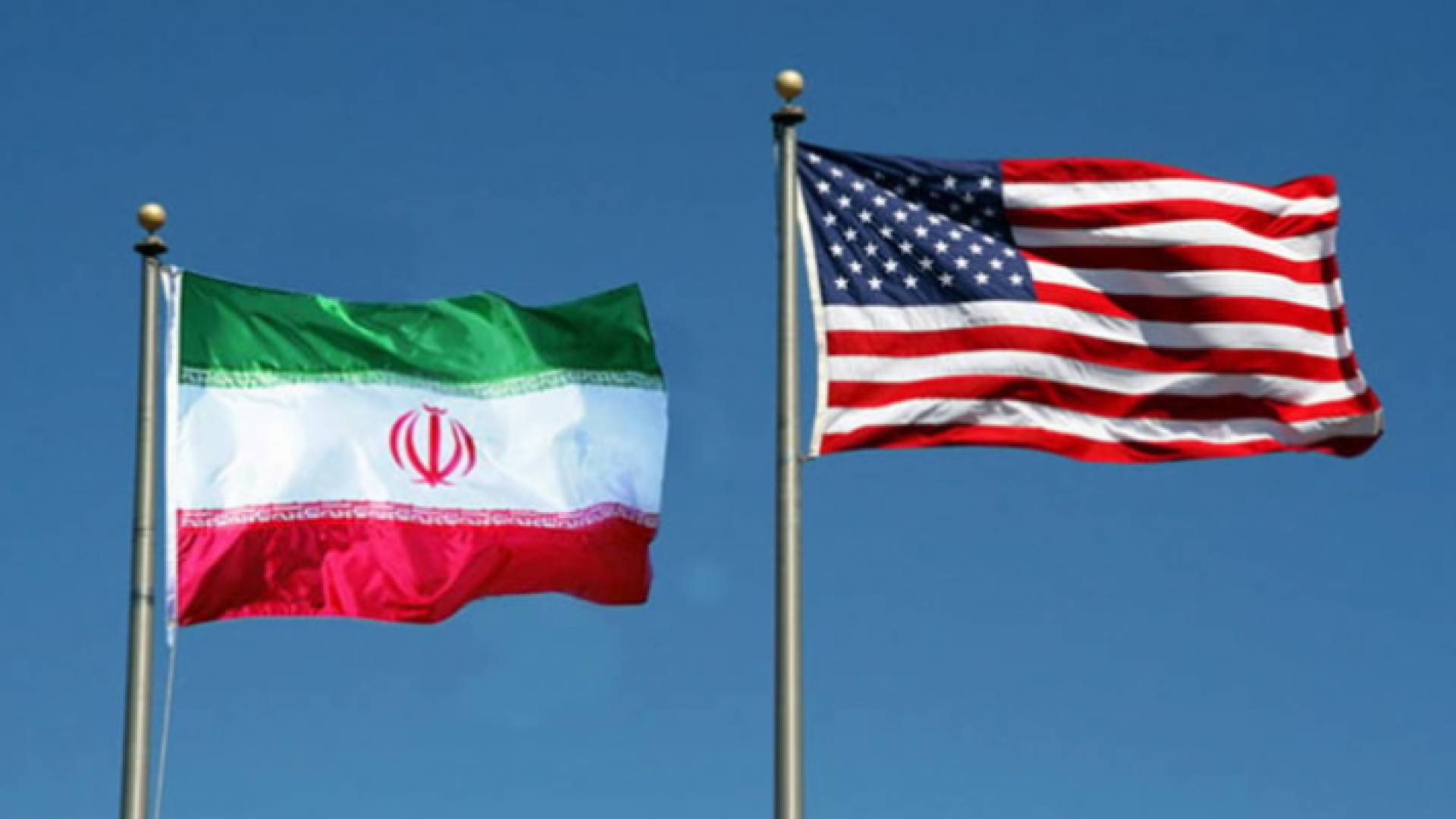 العلمان الأمريكي والإيراني