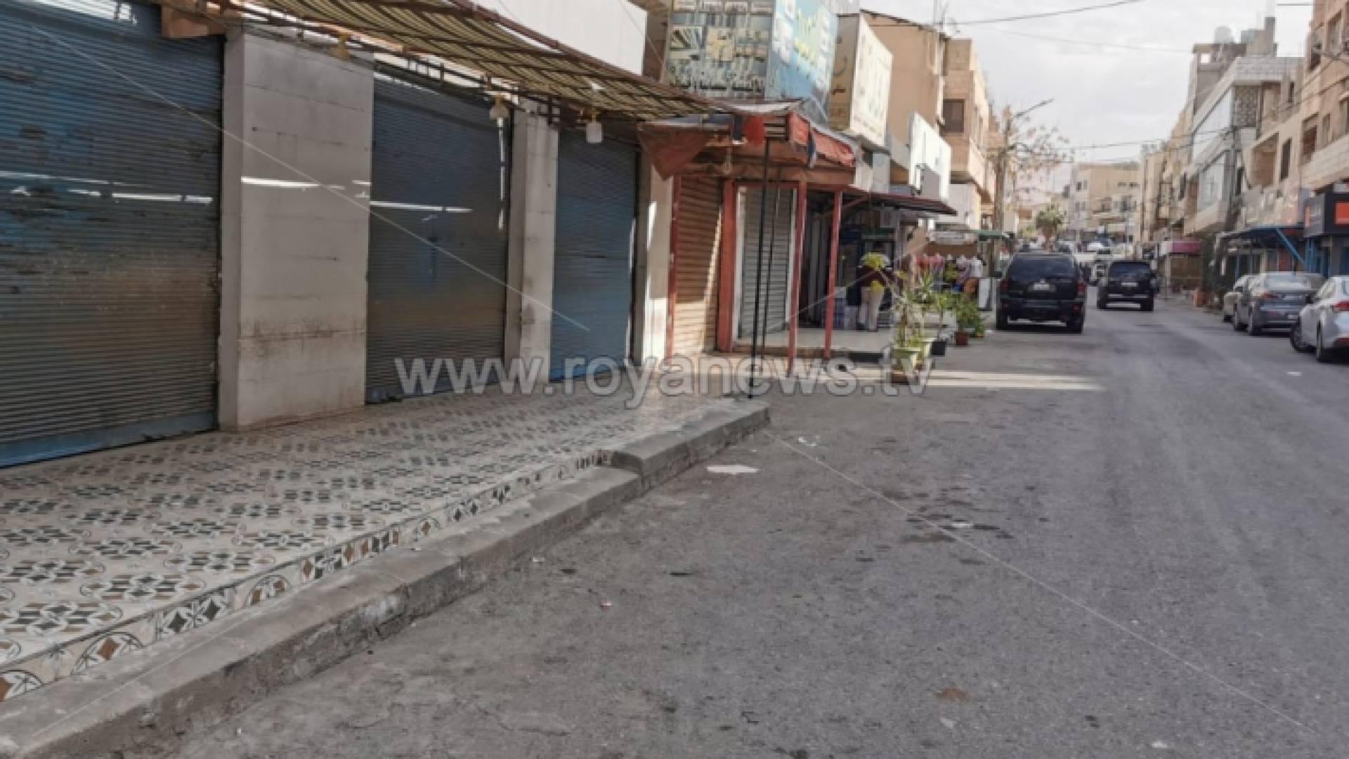 جانب من إغلاق المحال في الطفيلة