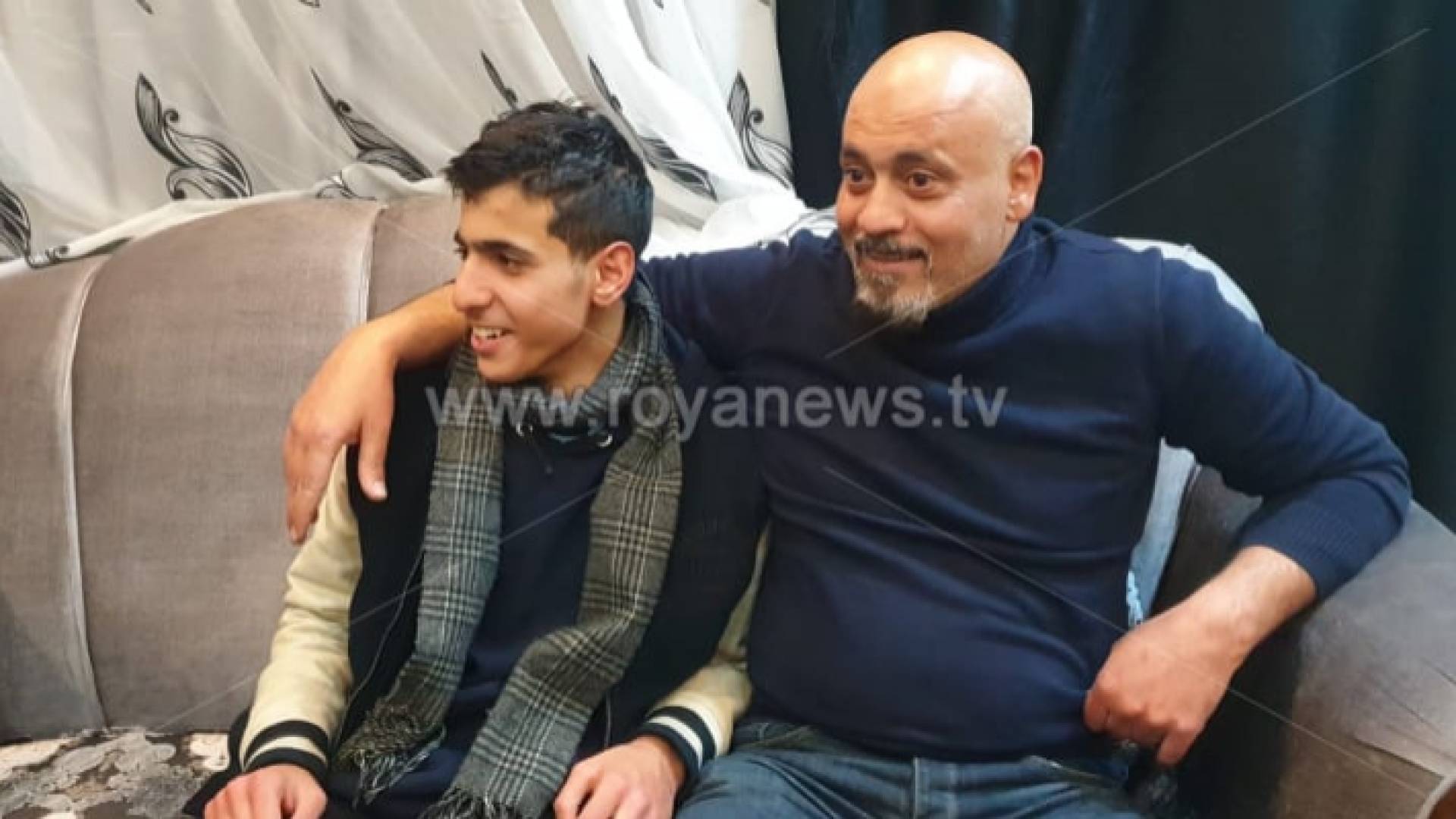 الطفل أيهم العمري ووالده