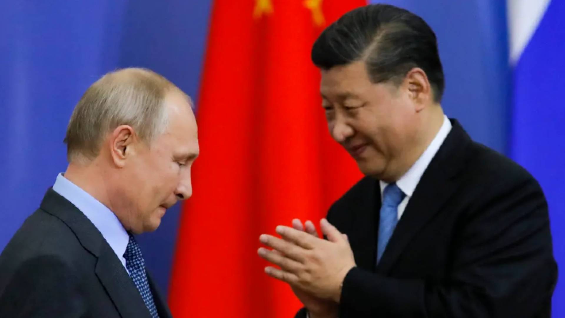 صورة أرشيفية للرئيس الروسي فلاديمير بوتين ونظيره الصيني شي جينبينغ