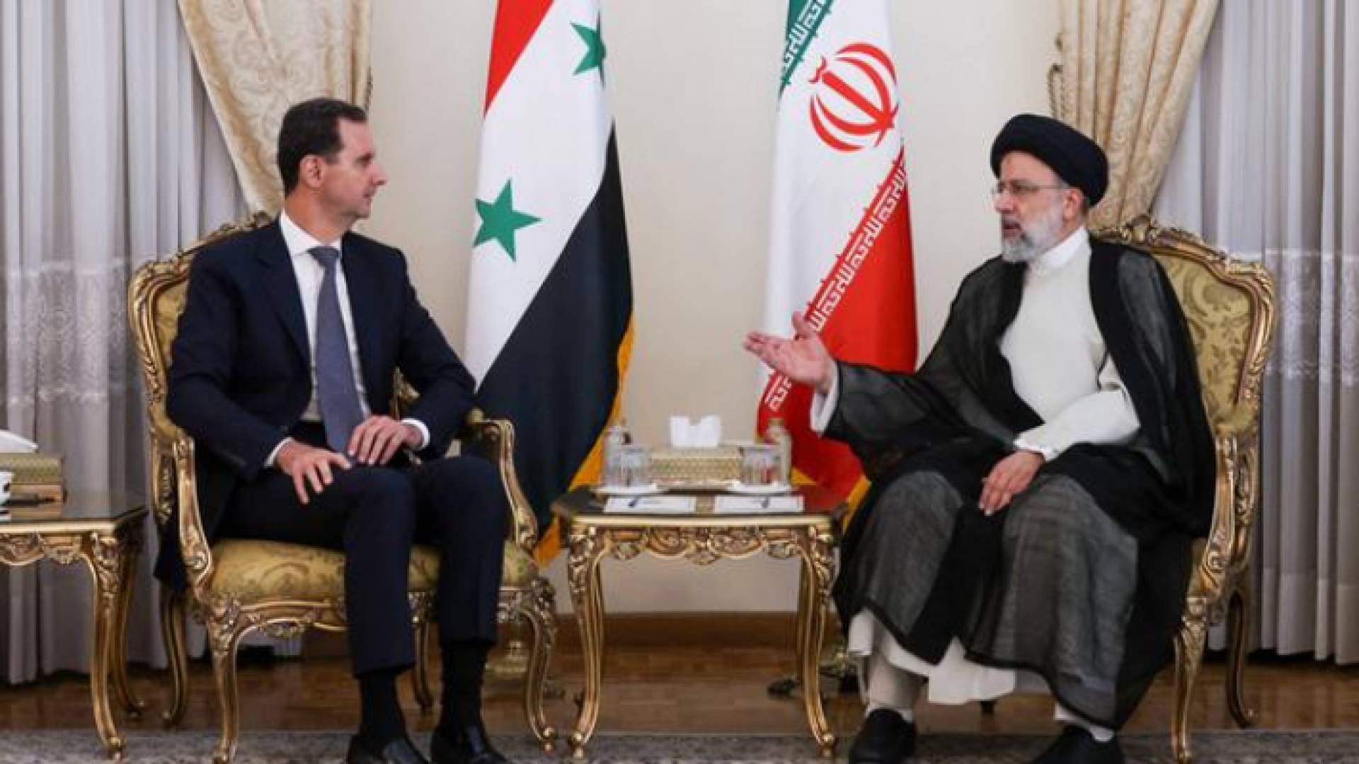 بشار الأسد والرئيس الإيراني