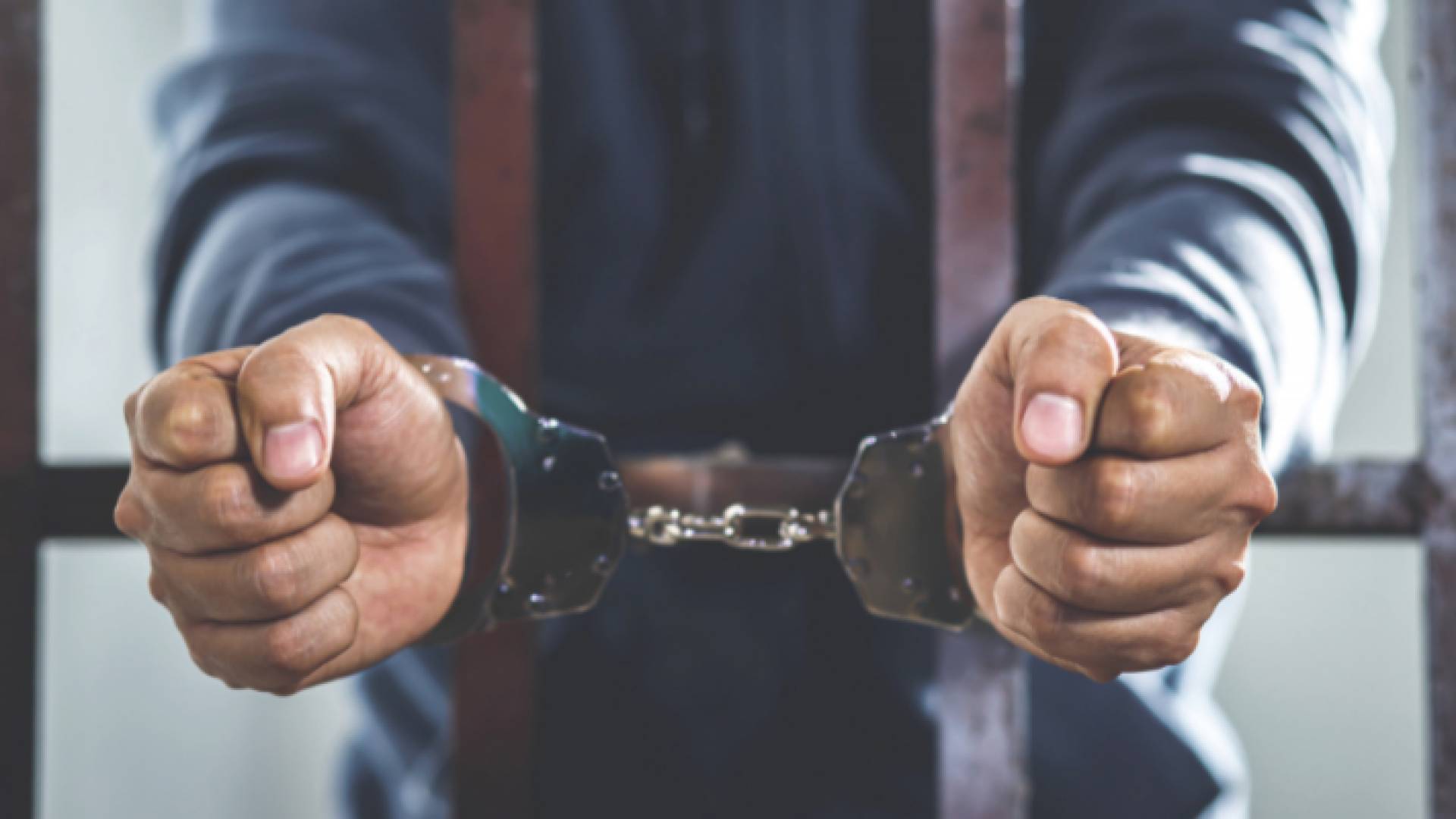 صورة تعبيرية لشخص داخل الحبس