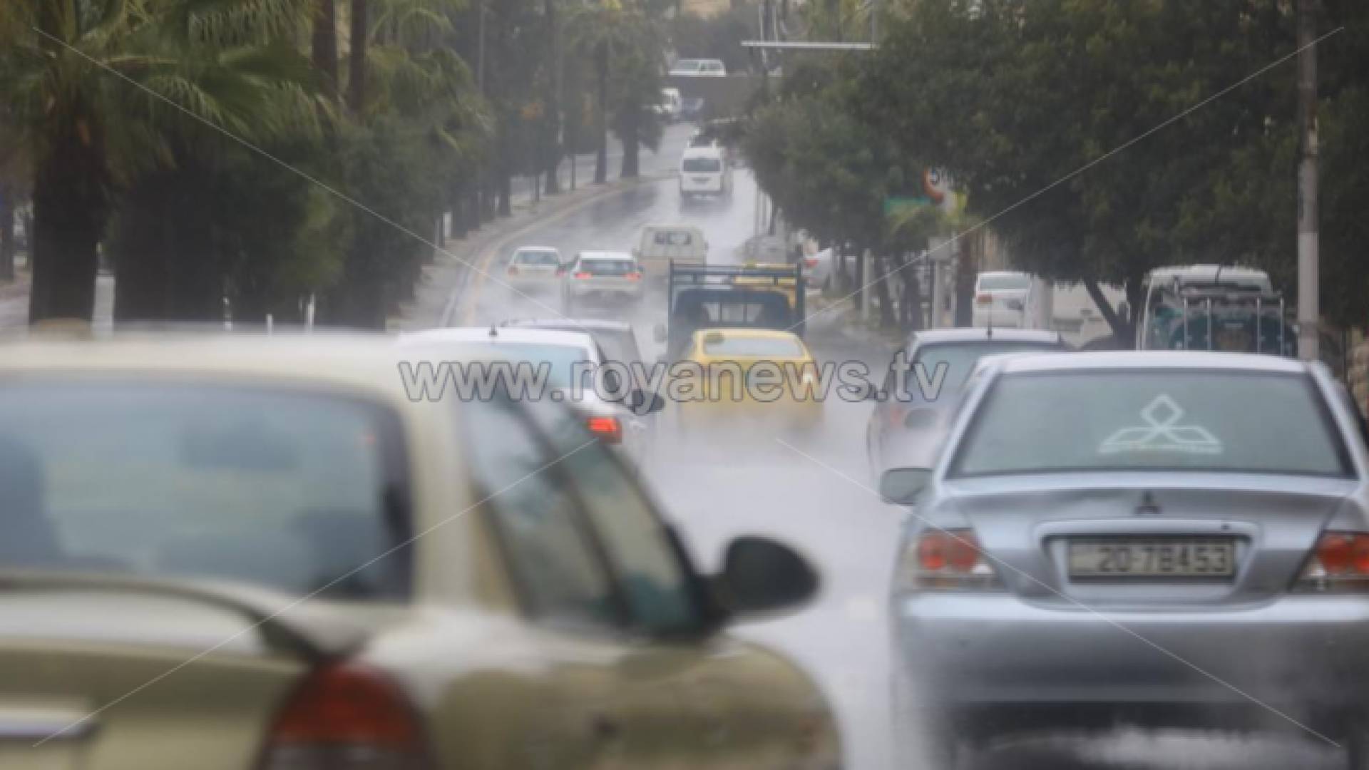 أمطار في أحد شوارع العاصمة عمان