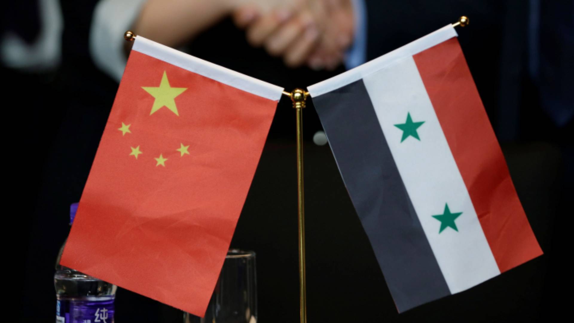 العلمان الصيني والسوري