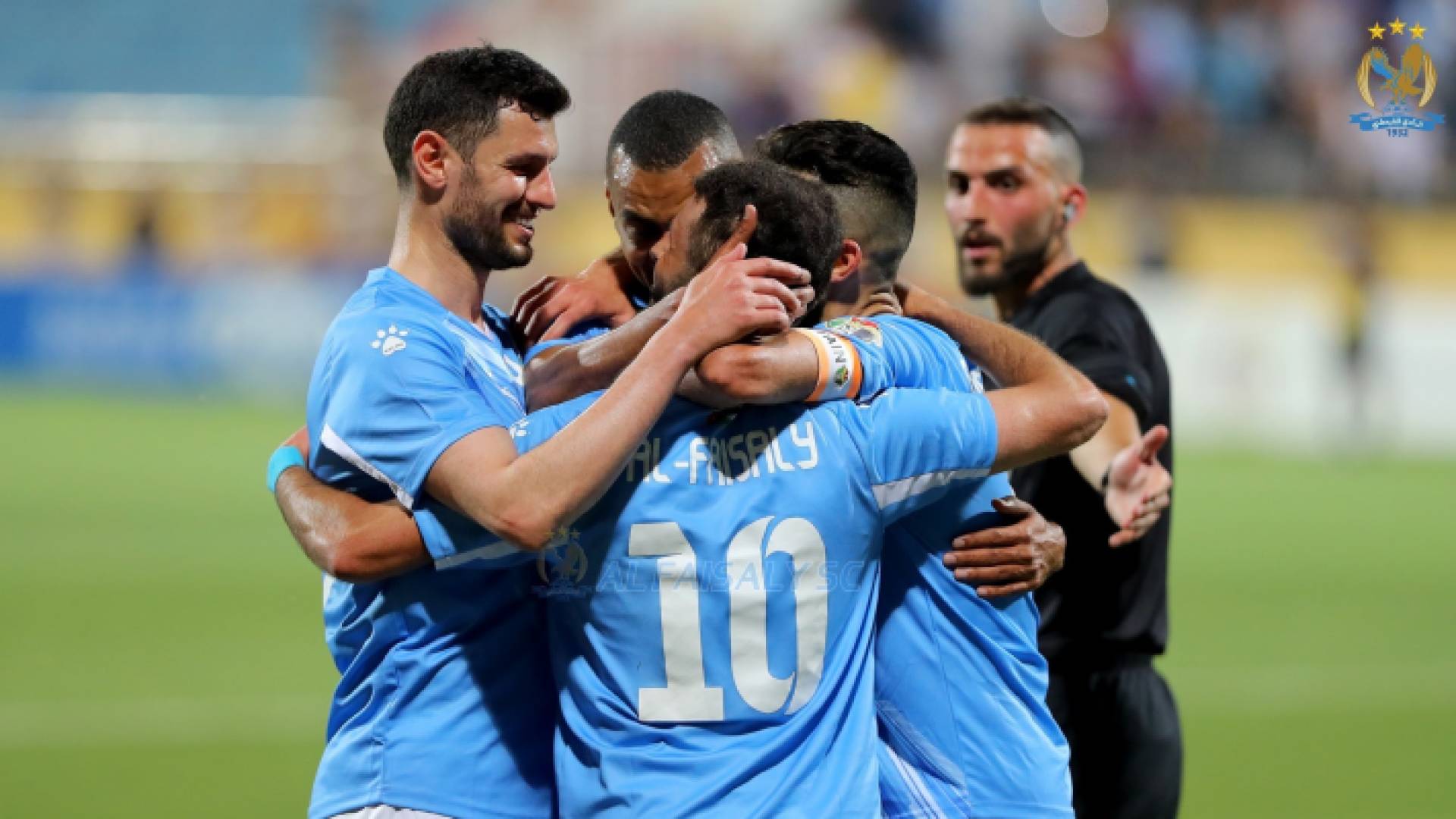 لاعبو الفيصلي يحتفلون بهدف خلال البطولة