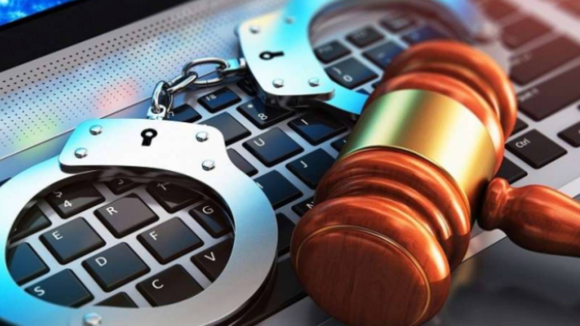 جهاز كمبيوتر وأصفاد "تعبيرية"