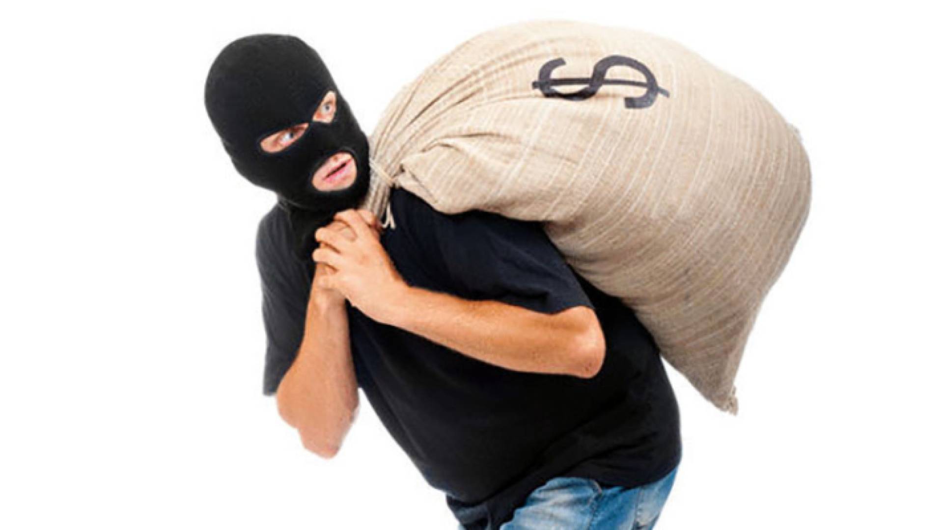 شخص ملثم يحمل نقودا "تعبيرية"