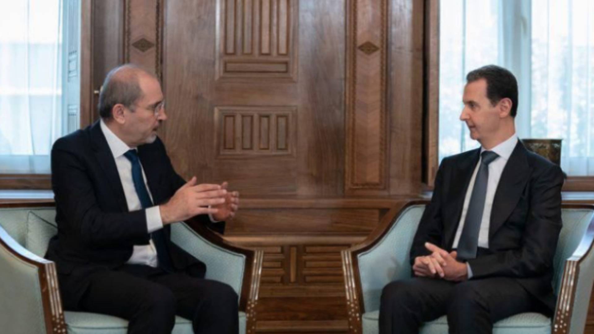 الرئيس السوري بشار الأسد ووزير الخارجية أيمن الصفدي