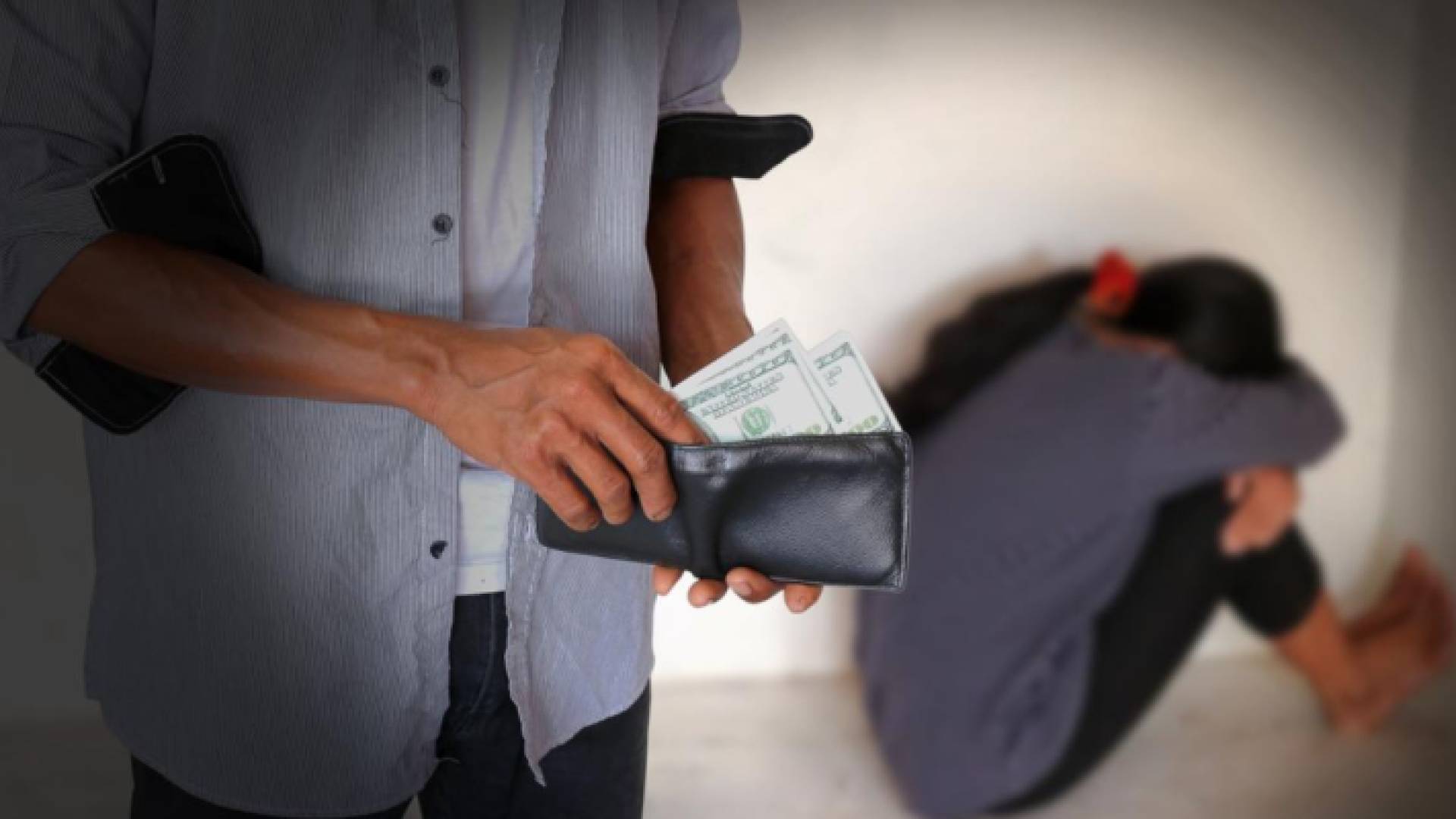 صورة تعبر عن جريمة الاتجار بالبشر