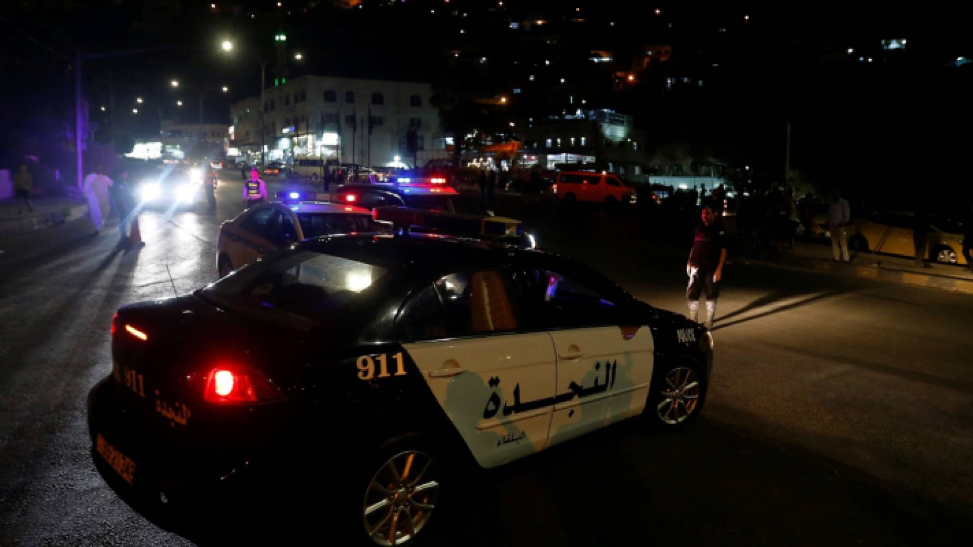 دوريات أمنية في أحد شوارع العاصمة عمان