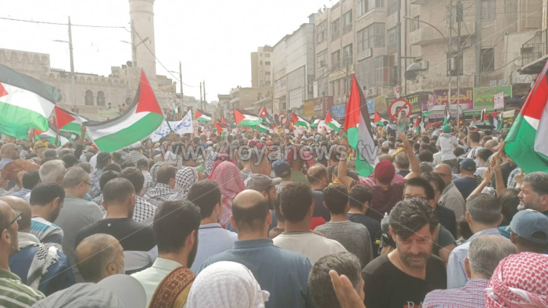 الصورة من المسيرات في منطقة وسط البلد في العاصمة عمان