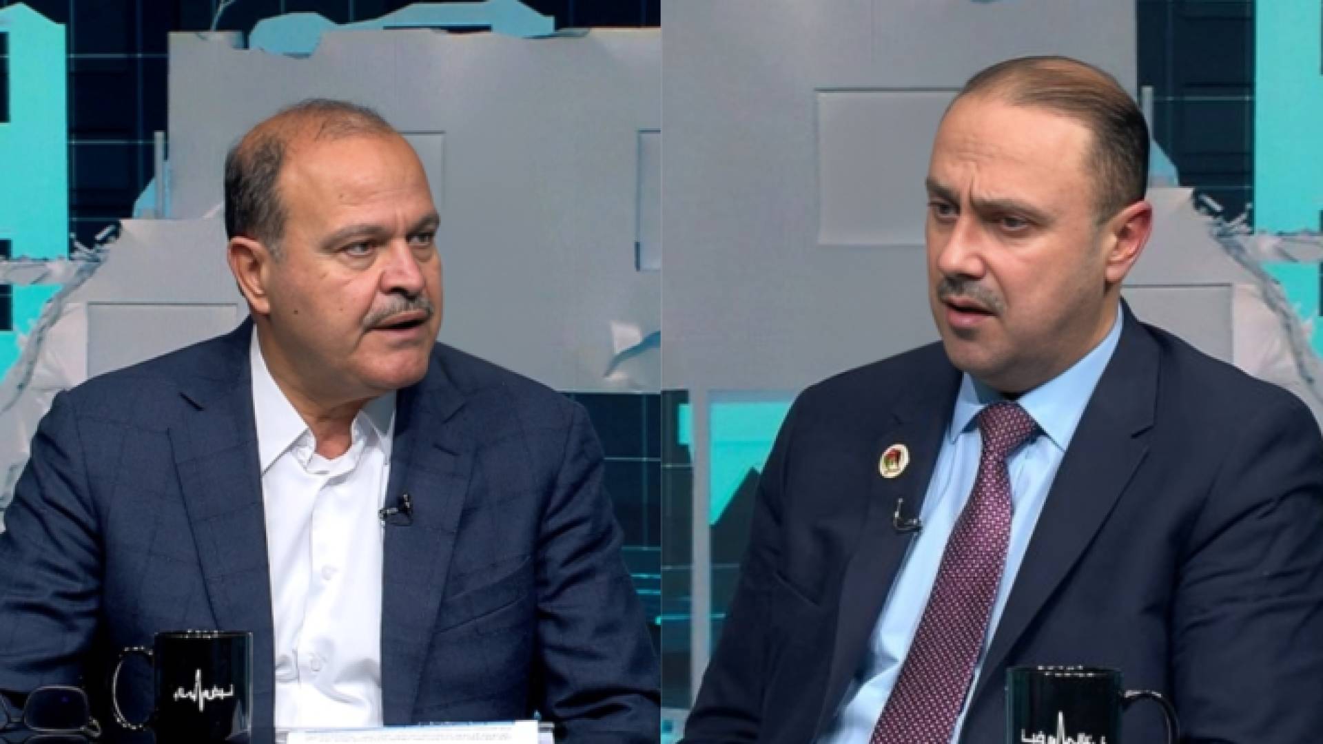 أمين عام حزب الميثاق الوطني الدكتور محمد المومني وعضو مجلس الأعيان حسين المجالي