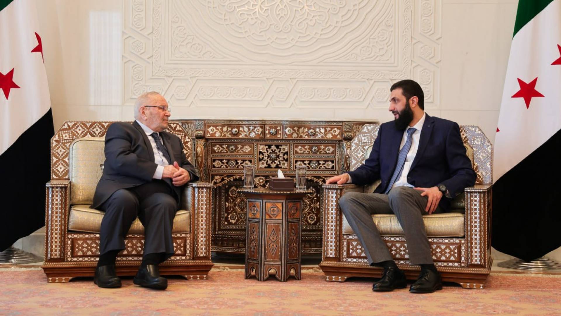 أحمد الشرع لدى لقائه الداعية السوري محمد راتب النابلسي