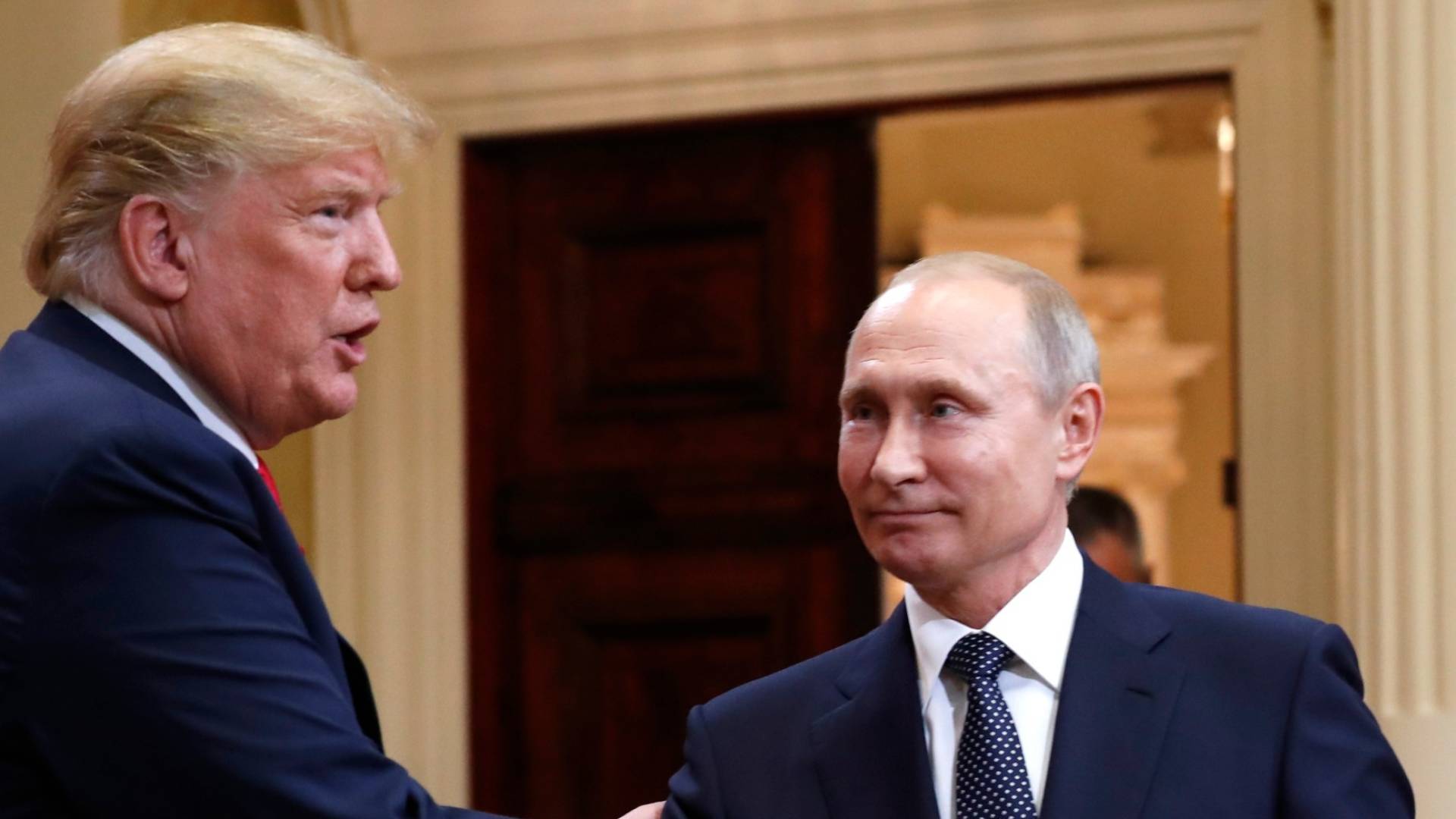 الرئيس الروسي فلاديمير بوتين وترمب